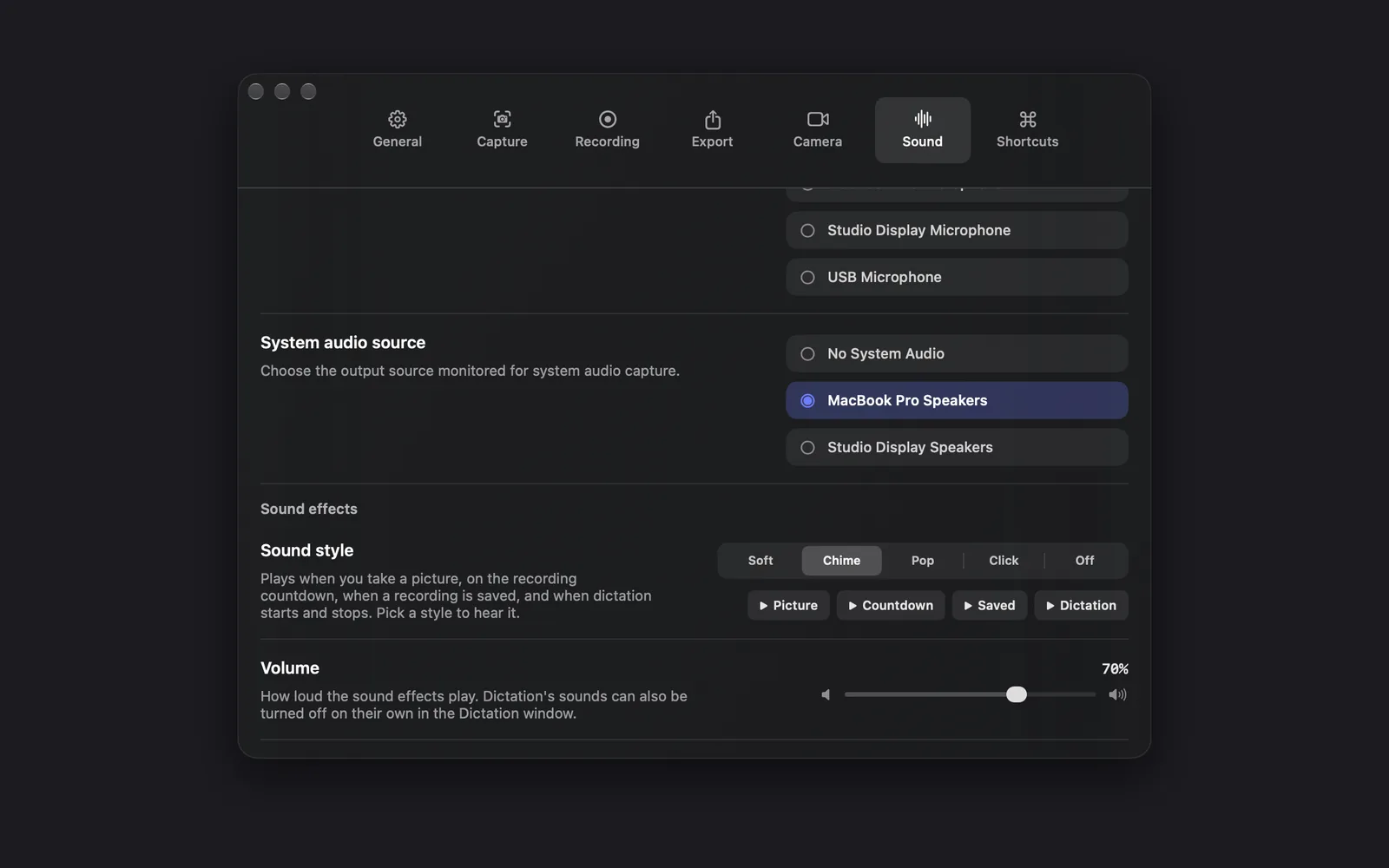 The Sound tab scrolled past the end of the microphone list (Studio Display Microphone, USB Microphone), System audio source with MacBook Pro Speakers picked over No System Audio and Studio Display Speakers, and Sound effects with Sound style on Chime, the Picture, Countdown, Saved and Dictation preview buttons, and Volume at 70%
